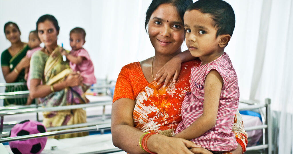 Mom holding child