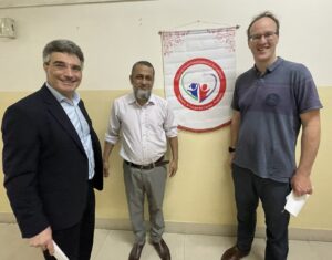 A warm welcome from Prof. Dr. Mohammad Sharifuzzaman, senior pediatric cardiac surgeon with NHF, for Children’s HeartLink medical volunteers Dr. Osama Jaber, pediatric cardiac surgeon, and Prof. Dr. Jamie Bentham, pediatric cardiologist.