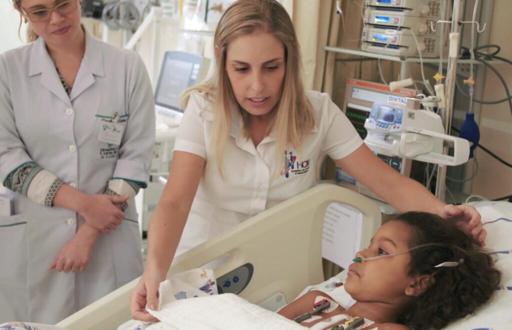 Nurse Bruna caring for child