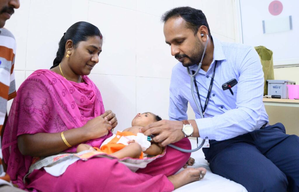 Mom and baby with doctor