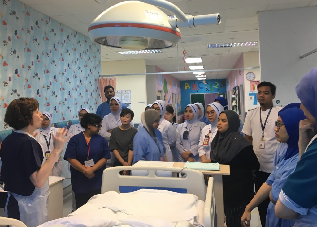 A medical volunteer from Birmingham Children's Hospital provides training for the staff of Serdang Hospital, our newest partner in Malaysia.